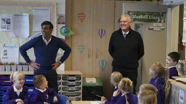 FILE - Britain's Prime Minister Rishi Sunak and Member of Parliament for Ashfield Lee Anderson visit a class at Woodland View Primary School, in Sutton-in-Ashfield, Nottinghamshire, England, Thursday, Jan. 4, 2024. The U.K.’s governing Conservative Party has suspended ties with one if its lawmakers after he accused London Mayor Sadiq Khan of being controlled by Islamists, as tensions over the Israel-Hamas war continue to roil British politics. (Jacob King/Pool Photo via AP, File) FILE - Britain's Prime Minister Rishi Sunak and Member of Parliament for Ashfield Lee Anderson visit a class at Woodland View Primary School, in Sutton-in-Ashfield, Nottinghamshire, England, Thursday, Jan. 4, 2024. The U.K.’s governing Conservative Party has suspended ties with one if its lawmakers after he accused London Mayor Sadiq Khan of being controlled by Islamists, as tensions over the Israel-Hamas war continue to roil British politics. (Jacob King/Pool Photo via AP, File)