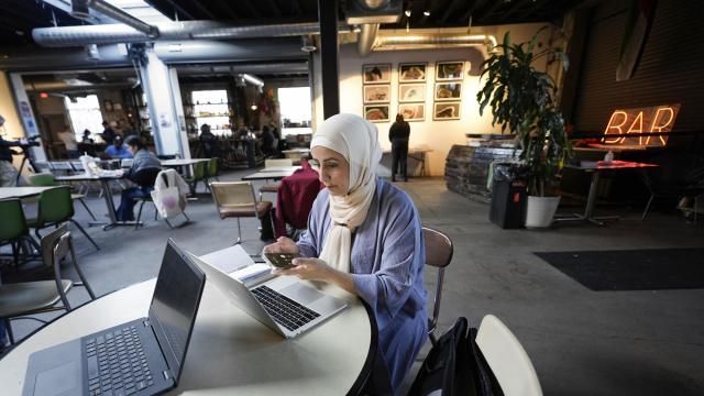 Mona Marwari, of Dearborn, calls a voter for the Listen to Michigan uncommitted vote campaign in Detroit, Tuesday, Feb. 20, 2024. Michigan voters are poised to cast ballots in their respective presidential primaries on Tuesday but a feeling of voter apathy has swept over the state. Both major parties have said that they must win Michigan to secure the White House this year but they're struggling to connect with voters. (AP Photo/Paul Sancya) Mona Marwari, of Dearborn, calls a voter for the Listen to Michigan uncommitted vote campaign in Detroit, Tuesday, Feb. 20, 2024. Michigan voters are poised to cast ballots in their respective presidential primaries on Tuesday but a feeling of voter apathy has swept over the state. Both major parties have said that they must win Michigan to secure the White House this year but they're struggling to connect with voters. (AP Photo/Paul Sancya)