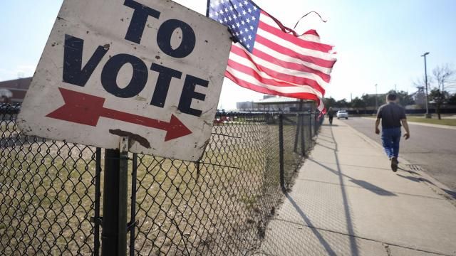 A voter walks to a Michigan primary election location in Dearborn, Mich., Tuesday, Feb. 27, 2024. Michigan is the last major primary state before Super Tuesday and a critical swing state in November's general election. (AP Photo/Paul Sancya) A voter walks to a Michigan primary election location in Dearborn, Mich., Tuesday, Feb. 27, 2024. Michigan is the last major primary state before Super Tuesday and a critical swing state in November's general election. (AP Photo/Paul Sancya)