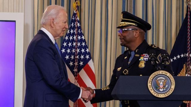 President Joe Biden shakes hands with James White, Detroit’s chief of police, before discussing his administration’s efforts to address crime, at the White House in Washington, on Wednesday, Feb. 28, 2024. “Thanks to my American rescue plan, which I might note, not a single person on the other team voted for, we provide $350 billion — $350 billion — that was available to deal with these issues,” Biden said here. (Anna Rose Layden/The New York Times)