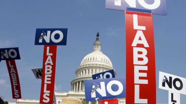 FILE - People with the group No Labels hold signs during a rally on Capitol Hill in Washington, July 13, 2013. The third-party presidential movement No Labels plans to meet on March 8, 2024, amid fierce pressure on donors and potential candidates from Donald Trump critics who fear the deep-pocketed group would help the former president return to the White House. No Labels Chief Strategist Ryan Clancy says no candidates will be selected at the meeting. (AP Photo/Jacquelyn Martin, File) FILE - People with the group No Labels hold signs during a rally on Capitol Hill in Washington, July 13, 2013. The third-party presidential movement No Labels plans to meet on March 8, 2024, amid fierce pressure on donors and potential candidates from Donald Trump critics who fear the deep-pocketed group would help the former president return to the White House. No Labels Chief Strategist Ryan Clancy says no candidates will be selected at the meeting. (AP Photo/Jacquelyn Martin, File)