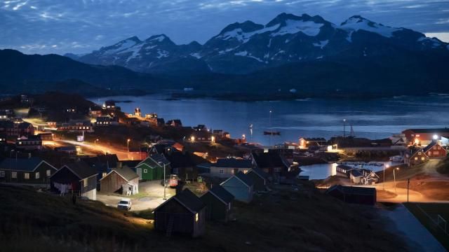 FILE - Homes are illuminated after the sunset in Tasiilaq, Greenland, Friday Aug. 16, 2019. A group of 143 Greenlandic women have sued the Danish state for having been fitted with coils in the 1960s and 1970s, and demand a total compensation of nearly 43 million kroner ($6.3 million), Danish broadcaster DR reported Monday, March 4, 2024.(AP Photo/Felipe Dana, File) FILE - Homes are illuminated after the sunset in Tasiilaq, Greenland, Friday Aug. 16, 2019. A group of 143 Greenlandic women have sued the Danish state for having been fitted with coils in the 1960s and 1970s, and demand a total compensation of nearly 43 million kroner ($6.3 million), Danish broadcaster DR reported Monday, March 4, 2024.(AP Photo/Felipe Dana, File)