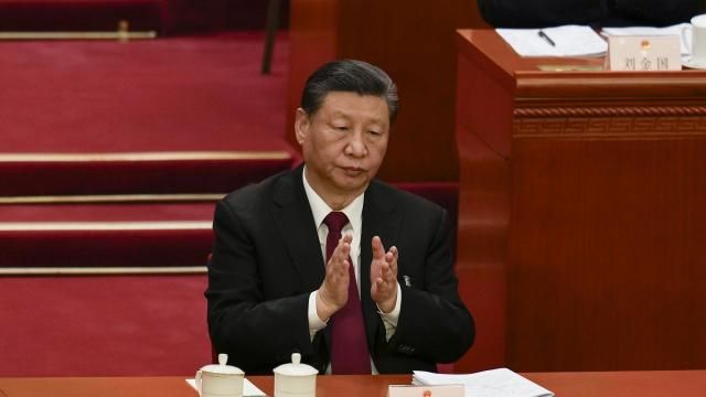 Chinese President Xi Jinping applauds during the opening session of the National People's Congress (NPC) at the Great Hall of the People in Beijing, China, Tuesday, March 5, 2024. (AP Photo/Ng Han Guan) Chinese President Xi Jinping applauds during the opening session of the National People's Congress (NPC) at the Great Hall of the People in Beijing, China, Tuesday, March 5, 2024. (AP Photo/Ng Han Guan)