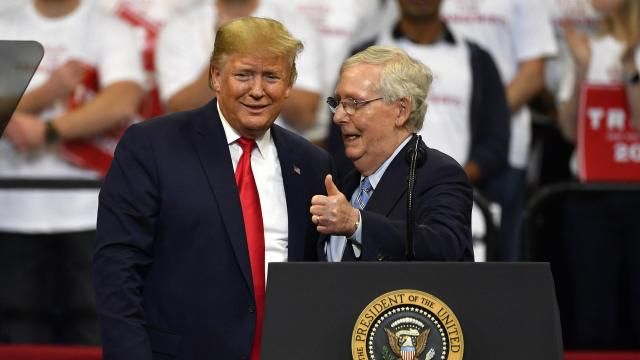 FILE - President Donald Trump, left, and Senate Majority Leader Mitch McConnell of Ky., greet each other during a campaign rally in Lexington, Ky., Nov. 4, 2019. McConnell is the highest ranking Republican in Congress who has yet to endorse Donald Trump's bid to return to the White House. But that's potentially about to change. McConnell's political team and Trump's campaign have been in talks over a possible endorsement and a strategy to unite Republicans on the party's ticket for the November election. (AP Photo/Timothy D. Easley, File) FILE - President Donald Trump, left, and Senate Majority Leader Mitch McConnell of Ky., greet each other during a campaign rally in Lexington, Ky., Nov. 4, 2019. McConnell is the highest ranking Republican in Congress who has yet to endorse Donald Trump's bid to return to the White House. But that's potentially about to change. McConnell's political team and Trump's campaign have been in talks over a possible endorsement and a strategy to unite Republicans on the party's ticket for the November election. (AP Photo/Timothy D. Easley, File)
