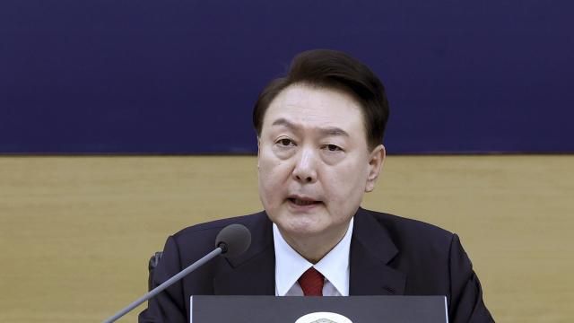 South Korean President Yoon Suk Yeol speaks during a cabinet meeting at the government complex in Sejong, South Korea, Wednesday, March 6, 2024. The prolonged walkouts by junior doctors won't be tolerated, South Korea’s president said Wednesday, calling them "an illegal collective action" that threatens public health and shakes the country’s governing systems. (Jin Sung-chul/Yonhap via AP) South Korean President Yoon Suk Yeol speaks during a cabinet meeting at the government complex in Sejong, South Korea, Wednesday, March 6, 2024. The prolonged walkouts by junior doctors won't be tolerated, South Korea’s president said Wednesday, calling them "an illegal collective action" that threatens public health and shakes the country’s governing systems. (Jin Sung-chul/Yonhap via AP)