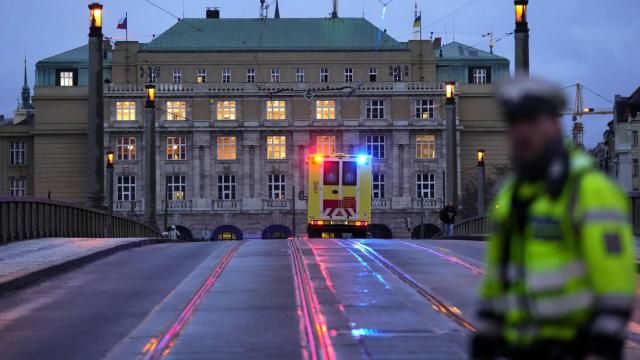 FILE - A police officer guards a street in downtown Prague, Czech Republic, on Dec. 21, 2023. Czech police say a shooting in downtown Prague has killed an unspecified number of people and wounded others. The Czech Parliament's upper house, the Senate followed the lower house on Wednesday March 6, 2024, to approve changes in the gun law that tighten requirements for owning a weapon following the worst mass killing in the nation's history. (AP Photo/Petr David Josek, File) FILE - A police officer guards a street in downtown Prague, Czech Republic, on Dec. 21, 2023. Czech police say a shooting in downtown Prague has killed an unspecified number of people and wounded others. The Czech Parliament's upper house, the Senate followed the lower house on Wednesday March 6, 2024, to approve changes in the gun law that tighten requirements for owning a weapon following the worst mass killing in the nation's history. (AP Photo/Petr David Josek, File)