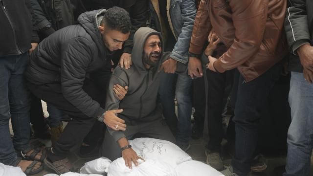 Palestinians mourn relatives killed in the Israeli bombardments of the Gaza Strip in front of the morgue of the Al Aqsa Hospital in Deir al Balah, Gaza Strip, on Thursday, March 7, 2024. (AP Photo/Adel Hana) Palestinians mourn relatives killed in the Israeli bombardments of the Gaza Strip in front of the morgue of the Al Aqsa Hospital in Deir al Balah, Gaza Strip, on Thursday, March 7, 2024. (AP Photo/Adel Hana)