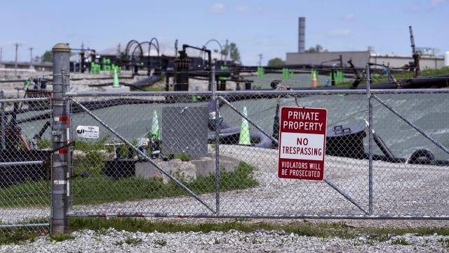FILE - A no trespassing sign hangs on a fence around the West Lake Landfill Superfund site on Friday, April 21, 2023, in Bridgeton, Mo. The Senate has passed legislation that would compensate Americans exposed to radiation by the government by renewing a law initially passed more than three decades ago. The bill passed the Senate 69-30, with 20 Republicans and all but two Democrats voting in favor. But its prospects in the House are uncertain. (AP Photo/Jeff Roberson, File) FILE - A no trespassing sign hangs on a fence around the West Lake Landfill Superfund site on Friday, April 21, 2023, in Bridgeton, Mo. The Senate has passed legislation that would compensate Americans exposed to radiation by the government by renewing a law initially passed more than three decades ago. The bill passed the Senate 69-30, with 20 Republicans and all but two Democrats voting in favor. But its prospects in the House are uncertain. (AP Photo/Jeff Roberson, File)