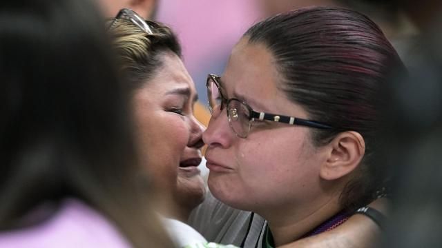 Felicia Martinez, left, and Evadulia Orta, right, both whose children were among 19 children killed in the massacre at Robb Elementary, embrace after speaking at a special city council meeting in Uvalde, Texas, Thursday, March 7, 2024. Almost two years after the deadly school shooting in Uvalde that left 19 children and two teachers dead, the city council met to discuss the results of an independent investigation it requested into the response by local police officers. (AP Photo/Eric Gay) Felicia Martinez, left, and Evadulia Orta, right, both whose children were among 19 children killed in the massacre at Robb Elementary, embrace after speaking at a special city council meeting in Uvalde, Texas, Thursday, March 7, 2024. Almost two years after the deadly school shooting in Uvalde that left 19 children and two teachers dead, the city council met to discuss the results of an independent investigation it requested into the response by local police officers. (AP Photo/Eric Gay)