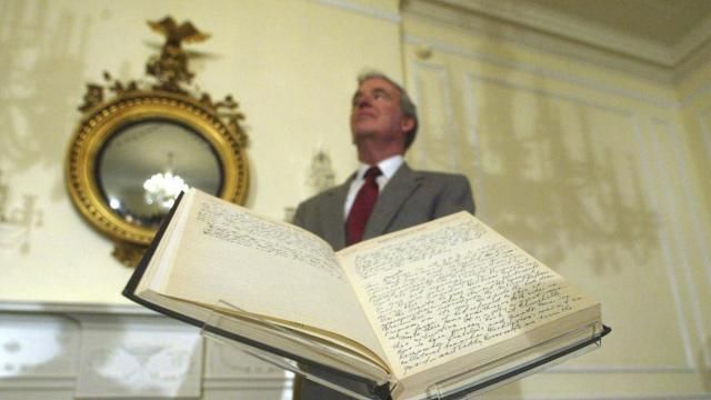 FILE - Archivist of the U.S John Carlin stands behind a 1947 Harry Truman presidential diary, July 10, 2003, at the National Archives in Washington. Presidents from George Washington to Joe Biden have kept presidential diaries. In them, they confide in themselves, express raw opinions, trace even the humdrum habits of their day and offer insight-on-the-fly on monumental decisions of their time. It's where they may also spill secrets they shouldn't. (AP Photo/Rick Bowmer, File) FILE - Archivist of the U.S John Carlin stands behind a 1947 Harry Truman presidential diary, July 10, 2003, at the National Archives in Washington. Presidents from George Washington to Joe Biden have kept presidential diaries. In them, they confide in themselves, express raw opinions, trace even the humdrum habits of their day and offer insight-on-the-fly on monumental decisions of their time. It's where they may also spill secrets they shouldn't. (AP Photo/Rick Bowmer, File)