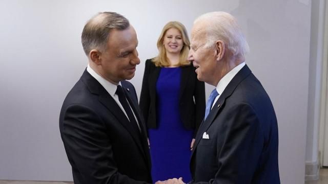 FILE - President Joe Biden, right, is greeted by Polish President Andrzej Duda, Feb. 22, 2023, at the Presidential Palace in Warsaw. Slovakia President Suzana Caputova stands behind. Poland's president and prime minister are due to meet with President Joe Biden at the White House and with congressional leaders who they hope will spur Washington to invest more in Ukraine's defense at a critical moment in the war in Europe. (AP Photo/ Evan Vucci, File) FILE - President Joe Biden, right, is greeted by Polish President Andrzej Duda, Feb. 22, 2023, at the Presidential Palace in Warsaw. Slovakia President Suzana Caputova stands behind. Poland's president and prime minister are due to meet with President Joe Biden at the White House and with congressional leaders who they hope will spur Washington to invest more in Ukraine's defense at a critical moment in the war in Europe. (AP Photo/ Evan Vucci, File)