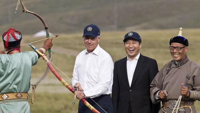 FILE - U.S. Vice President Joe Biden, center left, accompanied by Mongolian Prime Minister Sukhbaatar Batbold, center right, tries out archery during a tour in Ulan Bator, Mongolia, Aug. 22, 2011. The release of a transcript of Biden's interview with prosecutors investigating his handling of classified documents offers a rare window into the day-to-day life for the president. One question morphed into a well-worn tale of that one time he "embarrassed the hell" out of the leader of Mongolia. (AP Photo/Andy Wong, File) FILE - U.S. Vice President Joe Biden, center left, accompanied by Mongolian Prime Minister Sukhbaatar Batbold, center right, tries out archery during a tour in Ulan Bator, Mongolia, Aug. 22, 2011. The release of a transcript of Biden's interview with prosecutors investigating his handling of classified documents offers a rare window into the day-to-day life for the president. One question morphed into a well-worn tale of that one time he "embarrassed the hell" out of the leader of Mongolia. (AP Photo/Andy Wong, File)