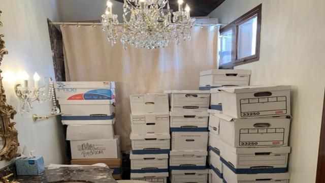 This image, contained in the indictment against former President Donald Trump, shows boxes of records stored in a bathroom and shower in the Lake Room at Trump's Mar-a-Lago estate in Palm Beach, Fla. A federal judge is set to hear arguments on whether to dismiss the classified documents prosecution of Donald Trump. His lawyers say the former president was entitled under the Presidential Records Act to keep the sensitive documents with him when he left the White House and headed to Florida. (Justice Department via AP) This image, contained in the indictment against former President Donald Trump, shows boxes of records stored in a bathroom and shower in the Lake Room at Trump's Mar-a-Lago estate in Palm Beach, Fla. A federal judge is set to hear arguments on whether to dismiss the classified documents prosecution of Donald Trump. His lawyers say the former president was entitled under the Presidential Records Act to keep the sensitive documents with him when he left the White House and headed to Florida. (Justice Department via AP)