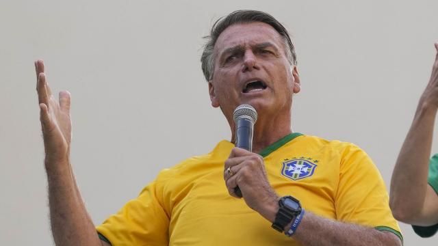 Former President Jair Bolsonaro addresses supporters during a rally in Sao Paulo., Brazil, Sunday, Feb. 25, 2024. Bolsonaro and some of his former top aides are under investigation into allegations they attempted plotted a coup to remove his successor, Luiz Inacio Lula da Silva. (AP Photo/Andre Penner) Former President Jair Bolsonaro addresses supporters during a rally in Sao Paulo., Brazil, Sunday, Feb. 25, 2024. Bolsonaro and some of his former top aides are under investigation into allegations they attempted plotted a coup to remove his successor, Luiz Inacio Lula da Silva. (AP Photo/Andre Penner)