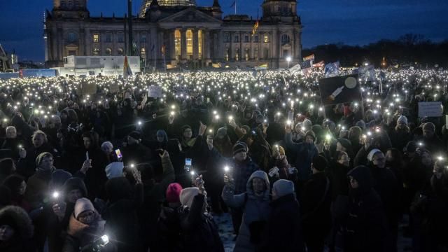 FILE - People hold up their cell phones as they protest the far-right Alternative for Germany, or AfD party, and right-wing extremism in front of the parliament building in Berlin, Germany, Jan. 21, 2024. Millions of Germans have joined rallies all over the country for weeks in a row, attending events with slogans such as "Never Again is Now." The protesters have been alarmed by the AfD's policies and its growing popularity. (AP Photo/Ebrahim Noroozi, File) FILE - People hold up their cell phones as they protest the far-right Alternative for Germany, or AfD party, and right-wing extremism in front of the parliament building in Berlin, Germany, Jan. 21, 2024. Millions of Germans have joined rallies all over the country for weeks in a row, attending events with slogans such as "Never Again is Now." The protesters have been alarmed by the AfD's policies and its growing popularity. (AP Photo/Ebrahim Noroozi, File)