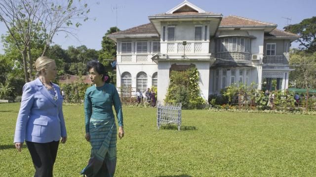 FILE - Myanmar's pro-democracy opposition leader Aung San Suu Kyi, right, and U.S. Secretary of State Hillary Rodham Clinton walk through the garden after meetings at Suu Kyi's residence in Yangon, Myanmar on Dec. 2, 2011. No bidders appeared at a court-ordered auction Wednesday, March 20, 2024 of the family home of Myanmar's imprisoned former leader, Aung San Suu Kyi, where she had been held under house arrest for nearly 15 years, legal officials said. (Saul Loeb/Pool Photo via AP, File) FILE - Myanmar's pro-democracy opposition leader Aung San Suu Kyi, right, and U.S. Secretary of State Hillary Rodham Clinton walk through the garden after meetings at Suu Kyi's residence in Yangon, Myanmar on Dec. 2, 2011. No bidders appeared at a court-ordered auction Wednesday, March 20, 2024 of the family home of Myanmar's imprisoned former leader, Aung San Suu Kyi, where she had been held under house arrest for nearly 15 years, legal officials said. (Saul Loeb/Pool Photo via AP, File)