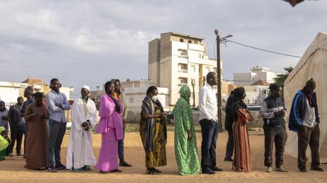 People wait to cast their votes outside a polling station during the presidential elections, in Dakar, Senegal, Sunday, March 24, 2024. (AP Photo/Mosa'ab Elshamy) People wait to cast their votes outside a polling station during the presidential elections, in Dakar, Senegal, Sunday, March 24, 2024. (AP Photo/Mosa'ab Elshamy)