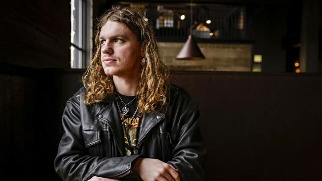 Dakota Adams poses for a photograph during an interview, Feb. 21, 2024, in Kalispell, Montana. Adams, the estranged son of Oath Keepers founder and imprisoned seditionist Stewart Rhodes, is running for the legislature in Montana as a Democrat. He said the Jan. 6, 2021 insurrection "as a whole" led to his decision to run for office. Adams is realistic about his chances of winning in the deep red northwestern corner of the state, but says he believes he can help some Republican voters see things differently. (AP Photo/Hunter D'Antuono) Dakota Adams poses for a photograph during an interview, Feb. 21, 2024, in Kalispell, Montana. Adams, the estranged son of Oath Keepers founder and imprisoned seditionist Stewart Rhodes, is running for the legislature in Montana as a Democrat. He said the Jan. 6, 2021 insurrection "as a whole" led to his decision to run for office. Adams is realistic about his chances of winning in the deep red northwestern corner of the state, but says he believes he can help some Republican voters see things differently. (AP Photo/Hunter D'Antuono)