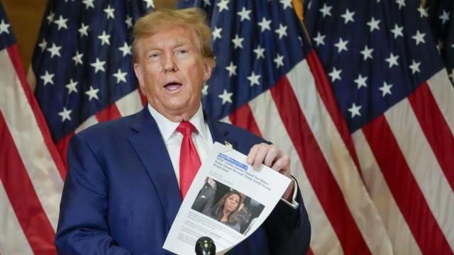 FILE - Former President Donald Trump holds up a copy of a story featuring New York Attorney General Letitia James while speaking during a news conference, Jan. 11, 2024, in New York. Trump could find out Monday, March 25, how New York state aims to collect over $457 million he owes in his civil business fraud case, even as he appeals the verdict that led to the gargantuan debt. (AP Photo/Mary Altaffer, File) FILE - Former President Donald Trump holds up a copy of a story featuring New York Attorney General Letitia James while speaking during a news conference, Jan. 11, 2024, in New York. Trump could find out Monday, March 25, how New York state aims to collect over $457 million he owes in his civil business fraud case, even as he appeals the verdict that led to the gargantuan debt. (AP Photo/Mary Altaffer, File)