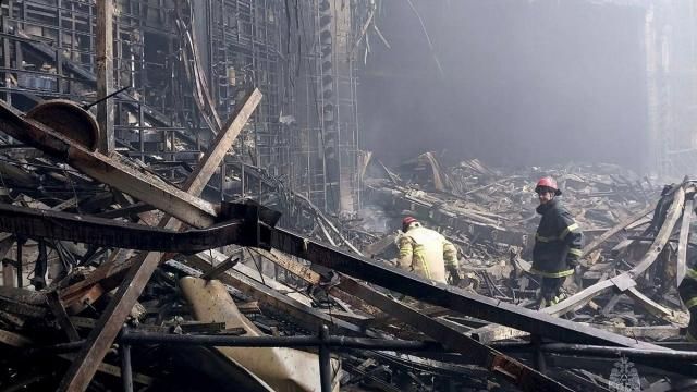 In this photo released by Russian Emergency Ministry Press Service on March 23, 2024, firefighters work in the burned concert hall after an attack on the building of the Crocus City Hall on the western edge of Moscow, Russia. A little-known U.S. intelligence principle called the "duty to warn" came into play ahead of the deadly attack on Moscow's outskirts. U.S. officials invoked that duty when warning Russian officials a full two weeks before Friday's attack. Just three days before the attack, Russian President Vladimir Putin dismissed such Western warnings as provocations. (Russian Emergency Ministry Press Service via AP) In this photo released by Russian Emergency Ministry Press Service on March 23, 2024, firefighters work in the burned concert hall after an attack on the building of the Crocus City Hall on the western edge of Moscow, Russia. A little-known U.S. intelligence principle called the "duty to warn" came into play ahead of the deadly attack on Moscow's outskirts. U.S. officials invoked that duty when warning Russian officials a full two weeks before Friday's attack. Just three days before the attack, Russian President Vladimir Putin dismissed such Western warnings as provocations. (Russian Emergency Ministry Press Service via AP)