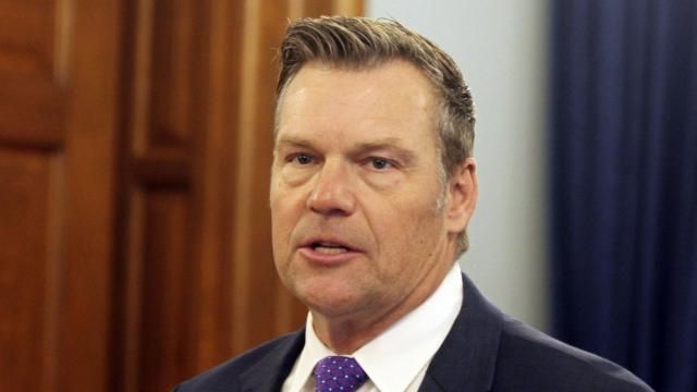 Kansas Attorney General Kris Kobach announces during a news conference that he and the attorneys general of 10 other states are suing the Biden administration over its new student loan repayment plan, Thursday, March 28, 2024, at the Statehouse in Topeka, Kan. The lawsuit to block a new student loan repayment plan that provides a faster path to cancellation and lower monthly payments for millions of borrowers. (AP Photo/John Hanna) Kansas Attorney General Kris Kobach announces during a news conference that he and the attorneys general of 10 other states are suing the Biden administration over its new student loan repayment plan, Thursday, March 28, 2024, at the Statehouse in Topeka, Kan. The lawsuit to block a new student loan repayment plan that provides a faster path to cancellation and lower monthly payments for millions of borrowers. (AP Photo/John Hanna)