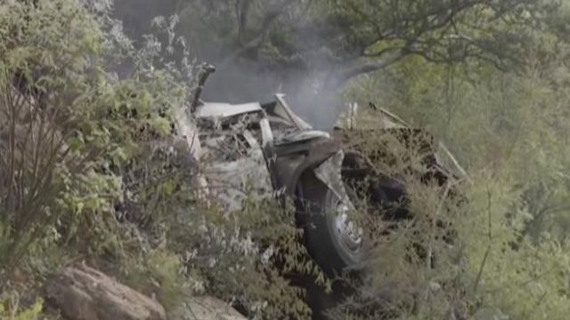 In this image taken from video provided by eNCA, a bus carrying worshippers headed to an Easter festival plunged off a bridge on a mountain pass and burst into flames in Limpopo, South Africa, on Thursday, March 28, 2024, killing multiple people, authorities said. (eNCA via AP) In this image taken from video provided by eNCA, a bus carrying worshippers headed to an Easter festival plunged off a bridge on a mountain pass and burst into flames in Limpopo, South Africa, on Thursday, March 28, 2024, killing multiple people, authorities said. (eNCA via AP)