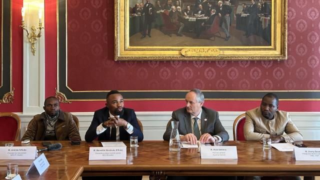 From left, Nduma Defense of Renewed Congo (NDR-C) President Jeremie N'Kuba, NDR-C spokesman Marcellin Shenkuku N'Kuba, Appel de Geneve general director Alain Deletroz and Collective of Movements for Change/Self-Defense Force of Congolese People (CMC-MDP) external relations Jimmy Butsitsi ink pledges to better protect civilians in the eastern Congo conflict during a ceremony in Geneva, Switzerland, Tuesday, March 26, 2024. The envoys of armed groups made commitments that their forces will work to end sexual violence, food insecurity and conditions of famine, and to ensure greater access to health care in parts of increasingly violent eastern Congo that they operate in and control. (AP Photo/Jamey Keaten) From left, Nduma Defense of Renewed Congo (NDR-C) President Jeremie N'Kuba, NDR-C spokesman Marcellin Shenkuku N'Kuba, Appel de Geneve general director Alain Deletroz and Collective of Movements for Change/Self-Defense Force of Congolese People (CMC-MDP) external relations Jimmy Butsitsi ink pledges to better protect civilians in the eastern Congo conflict during a ceremony in Geneva, Switzerland, Tuesday, March 26, 2024. The envoys of armed groups made commitments that their forces will work to end sexual violence, food insecurity and conditions of famine, and to ensure greater access to health care in parts of increasingly violent eastern Congo that they operate in and control. (AP Photo/Jamey Keaten)