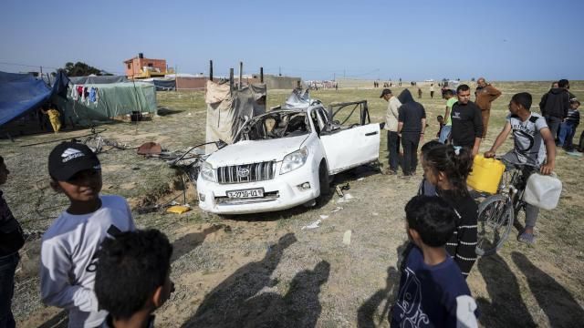 People inspect the site where World Central Kitchen workers were killed in Deir al-Balah, Gaza Strip, Tuesday, April 2, 2024. World Central Kitchen, an aid group, says an Israeli strike that hit its workers in Gaza killed at least seven people, including several foreigners. (AP Photo/Abdel Kareem Hana) People inspect the site where World Central Kitchen workers were killed in Deir al-Balah, Gaza Strip, Tuesday, April 2, 2024. World Central Kitchen, an aid group, says an Israeli strike that hit its workers in Gaza killed at least seven people, including several foreigners. (AP Photo/Abdel Kareem Hana)