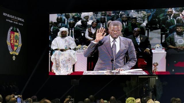 Bassirou Diomaye Faye is sworn in as Senegal's president in Dakar, Senegal, Tuesday, April 2, 2024. Senegal has sworn in Bassirou Diomaye Faye as its new president, completing the previously little-known opposition figure’s dramatic ascent from prison to the palace in recent weeks. Faye was released from prison less than two weeks before the March election following a political amnesty announced by the outgoing president. (AP Photo/Sylvain Cherkaoui) Bassirou Diomaye Faye is sworn in as Senegal's president in Dakar, Senegal, Tuesday, April 2, 2024. Senegal has sworn in Bassirou Diomaye Faye as its new president, completing the previously little-known opposition figure’s dramatic ascent from prison to the palace in recent weeks. Faye was released from prison less than two weeks before the March election following a political amnesty announced by the outgoing president. (AP Photo/Sylvain Cherkaoui)