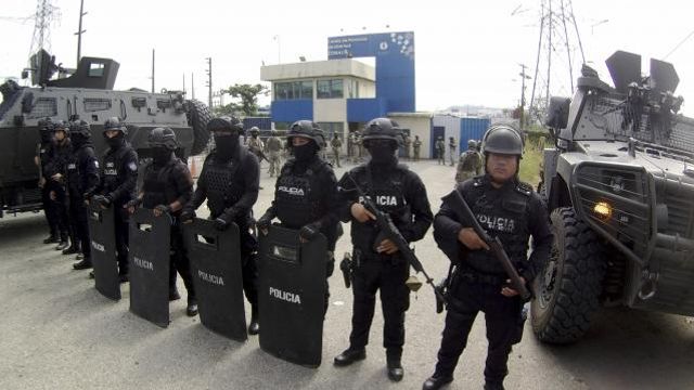 Police stand guard at the entrance of the penitentiary where former Vice President Jorge Glas is being held, in Guayaquil, Ecuador, Saturday, April 6, 2024. Ecuadorian police broke through the external doors of the Mexican Embassy in Quito, Friday evening, to arrest Glas, who had been residing there since December. (AP Photo/Cesar Munoz) Police stand guard at the entrance of the penitentiary where former Vice President Jorge Glas is being held, in Guayaquil, Ecuador, Saturday, April 6, 2024. Ecuadorian police broke through the external doors of the Mexican Embassy in Quito, Friday evening, to arrest Glas, who had been residing there since December. (AP Photo/Cesar Munoz)