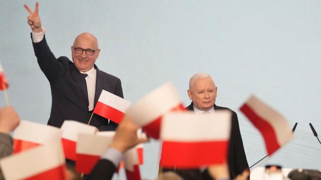 Conservative Law and Justice party leader Jaroslaw Kaczynski, right, joins supporters during Poland's local and regional elections in Warsaw, Poland, Sunday April 7, 2024. The vote is the first test at the ballot box for Prime Minister Donald Tusk four months after he took office. (AP Photo/Czarek Sokolowski) Conservative Law and Justice party leader Jaroslaw Kaczynski, right, joins supporters during Poland's local and regional elections in Warsaw, Poland, Sunday April 7, 2024. The vote is the first test at the ballot box for Prime Minister Donald Tusk four months after he took office. (AP Photo/Czarek Sokolowski)