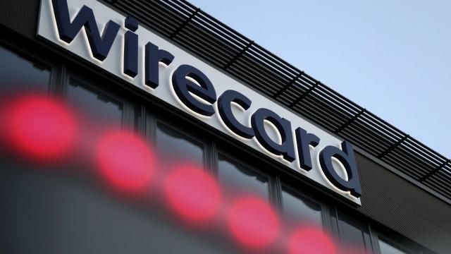 FILE - The logo of payment company Wirecard is pictured at the headquarters in Munich, Germany on July 20, 2020. Austria faces its biggest espionage scandal in decades as the arrest of a former intelligence officer brings to light evidence of extensive Russian infiltration, lax official oversight and behavior worthy of a spy novel. (AP Photo/Matthias Schrader, File) FILE - The logo of payment company Wirecard is pictured at the headquarters in Munich, Germany on July 20, 2020. Austria faces its biggest espionage scandal in decades as the arrest of a former intelligence officer brings to light evidence of extensive Russian infiltration, lax official oversight and behavior worthy of a spy novel. (AP Photo/Matthias Schrader, File)