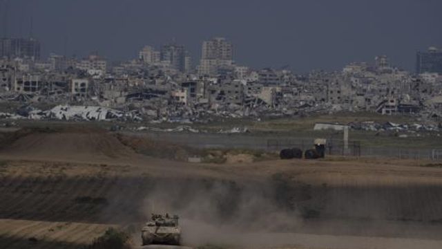 Israeli soldiers move on the top of a tank near the Israeli-Gaza border, as seen from southern Israel, Tuesday, April 9, 2024. (AP Photo/Leo Correa) Israeli soldiers move on the top of a tank near the Israeli-Gaza border, as seen from southern Israel, Tuesday, April 9, 2024. (AP Photo/Leo Correa)