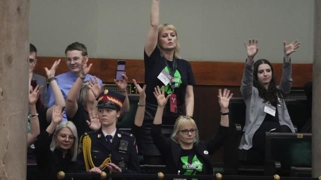 Abortion rights activists react during a debate in the Polish parliament from the gallery of the assembly, in Warsaw, Poland, on Thursday April 11, 2024. The traditionally Catholic nation has one of the most restrictive laws in Europe — but the reality is that many women terminate pregnancies at home with pills mailed from abroad. (AP Photo/Czarek Sokolowski) Abortion rights activists react during a debate in the Polish parliament from the gallery of the assembly, in Warsaw, Poland, on Thursday April 11, 2024. The traditionally Catholic nation has one of the most restrictive laws in Europe — but the reality is that many women terminate pregnancies at home with pills mailed from abroad. (AP Photo/Czarek Sokolowski)