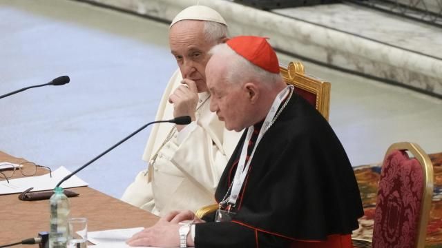 FILE - Pope Francis, left, listens to Cardinal Marc Ouellet's opening address as he attends the opening of a 3-day Symposium on Vocations in the Paul VI hall at the Vatican, Thursday, Feb. 17, 2022. The Holy See has formally protested to France after a French court ruled that a former high-ranking Vatican official was liable for what the court determined to be the wrongful dismissal of a nun from a religious order. (AP Photo/Gregorio Borgia, File) FILE - Pope Francis, left, listens to Cardinal Marc Ouellet's opening address as he attends the opening of a 3-day Symposium on Vocations in the Paul VI hall at the Vatican, Thursday, Feb. 17, 2022. The Holy See has formally protested to France after a French court ruled that a former high-ranking Vatican official was liable for what the court determined to be the wrongful dismissal of a nun from a religious order. (AP Photo/Gregorio Borgia, File)