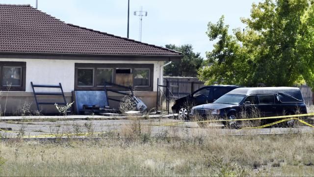 FILE - A hearse and debris can be seen at the rear of the Return to Nature Funeral Home, Oct. 5, 2023, in Penrose, Colo. The couple who owned the Colorado funeral home — where 190 decaying bodies were discovered last year — have been indicted on federal charges for fraudulently obtaining nearly $900,000 in pandemic relief funds from the U.S. government, according to court documents unsealed Monday, April 15, 2024. (Jerilee Bennett/The Gazette via AP, File) FILE - A hearse and debris can be seen at the rear of the Return to Nature Funeral Home, Oct. 5, 2023, in Penrose, Colo. The couple who owned the Colorado funeral home — where 190 decaying bodies were discovered last year — have been indicted on federal charges for fraudulently obtaining nearly $900,000 in pandemic relief funds from the U.S. government, according to court documents unsealed Monday, April 15, 2024. (Jerilee Bennett/The Gazette via AP, File)
