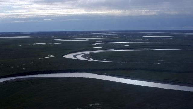This July 8, 2004, photo provided by the United States Geological Survey shows Fish Creek through the National Petroleum Reserve-Alaska, managed by the Bureau of Land Management on Alaska's North Slope. (David W. Houseknecht/United States Geological Survey via AP) This July 8, 2004, photo provided by the United States Geological Survey shows Fish Creek through the National Petroleum Reserve-Alaska, managed by the Bureau of Land Management on Alaska's North Slope. (David W. Houseknecht/United States Geological Survey via AP)