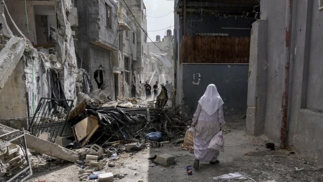 Palestinians inspect the destruction following an Israeli military raid in Nur Shams refugee camp, near the West Bank town of Tulkarem, Sunday, April 21, 2024. The Palestinian Red Crescent rescue service said 14 bodies have been recovered from the Nur Shams urban refugee camp since an Israeli military operation began in the area Thursday night. The Islamic Jihad militant group confirmed the deaths of three members. Another killed was a 15-year-old boy. The Israeli army said its forces killed 10 militants in the camp and surrounding areas while eight suspects were arrested. (AP Photo/Majdi Mohammed) Palestinians inspect the destruction following an Israeli military raid in Nur Shams refugee camp, near the West Bank town of Tulkarem, Sunday, April 21, 2024. The Palestinian Red Crescent rescue service said 14 bodies have been recovered from the Nur Shams urban refugee camp since an Israeli military operation began in the area Thursday night. The Islamic Jihad militant group confirmed the deaths of three members. Another killed was a 15-year-old boy. The Israeli army said its forces killed 10 militants in the camp and surrounding areas while eight suspects were arrested. (AP Photo/Majdi Mohammed)