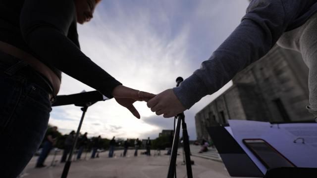 FILE - Benjamin Franklin High playwriting class students hold hands as they perform their play "The Capitol Project" on the steps of the Louisiana Capitol in Baton Rouge, La., March 27, 2024. Unlike recent years when there was an LGBTQ+ ally in the Louisiana governor's office, nothing stands in the way this year of legislation hostile to transgender people. Democratic former Gov. John Bel Edwards was able to block most such legislation in previous years through vetoes. Now conservative Republican Jeff Landry is in the governor's chair, and the legislation is advancing rapidly. (AP Photo/Gerald Herbert, File) FILE - Benjamin Franklin High playwriting class students hold hands as they perform their play "The Capitol Project" on the steps of the Louisiana Capitol in Baton Rouge, La., March 27, 2024. Unlike recent years when there was an LGBTQ+ ally in the Louisiana governor's office, nothing stands in the way this year of legislation hostile to transgender people. Democratic former Gov. John Bel Edwards was able to block most such legislation in previous years through vetoes. Now conservative Republican Jeff Landry is in the governor's chair, and the legislation is advancing rapidly. (AP Photo/Gerald Herbert, File)