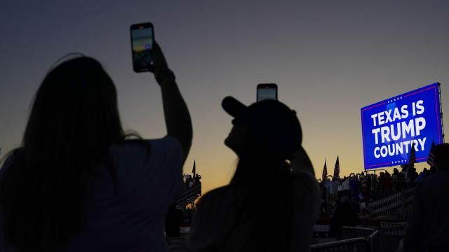 FILE - People hold their cellphones as they wait for the plane carrying former President Donald Trump to take off after a campaign rally at Waco Regional Airport Saturday, March 25, 2023, in Waco, Texas. Brad Parscale, the digital campaign operative who helped engineer Trump’s 2016 presidential victory, vows that his new, AI-powered platform will dramatically overhaul how campaigns are run. (AP Photo/Nathan Howard, File) FILE - People hold their cellphones as they wait for the plane carrying former President Donald Trump to take off after a campaign rally at Waco Regional Airport Saturday, March 25, 2023, in Waco, Texas. Brad Parscale, the digital campaign operative who helped engineer Trump’s 2016 presidential victory, vows that his new, AI-powered platform will dramatically overhaul how campaigns are run. (AP Photo/Nathan Howard, File)