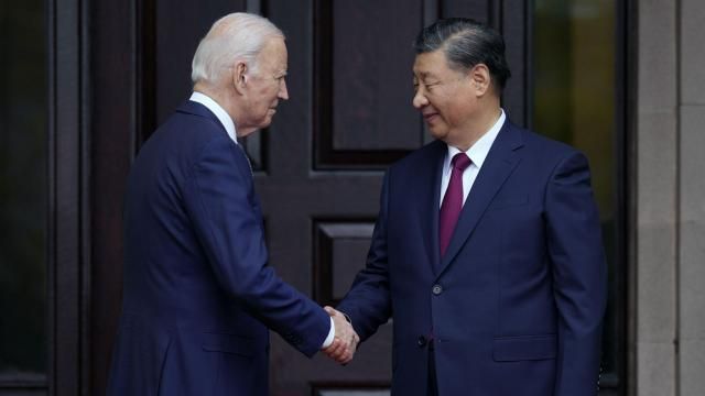 FILE - President Joe Biden, left, greets China's President President Xi Jinping, right, in Woodside, USA, Nov. 15, 2023. High-level envoys from the United States and China are set to meet in Geneva for talks about artificial intelligence including the risks of the technology and ways to set shared standards to manage it. The meeting Tuesday is billed as an opening exchange of views in an inter-governmental dialogue on AI agreed during a meeting between U.S. President Joe Biden and Chinese President Xi Jinping in San Francisco. (Doug Mills/The New York Times via AP, Pool, File)