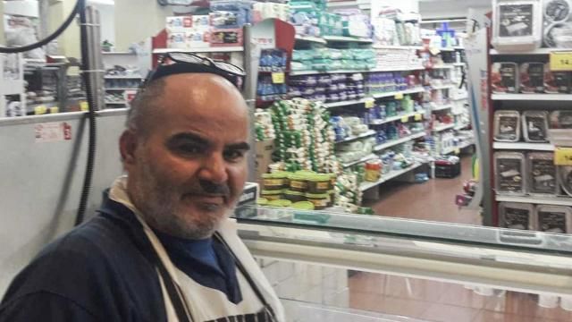 This 2021 photo provided by Haim Parag shows David Ben-Avraham at a supermarket in the Israeli town of Beit Shamesh, where he briefly worked, in Jerusalem. Ben-Avraham, a Palestinian who was born a Muslim but made the almost unheard-of decision to convert to Judaism years earlier, was fatally shot by an Israeli soldier. (Courtesy of Haim Parag via AP)