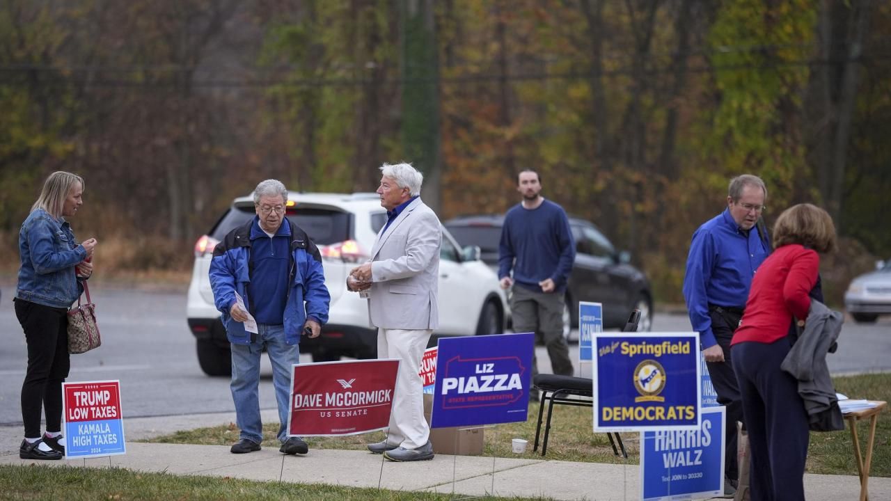 The Latest Trump and Harris cede stage to voters who'll also decide