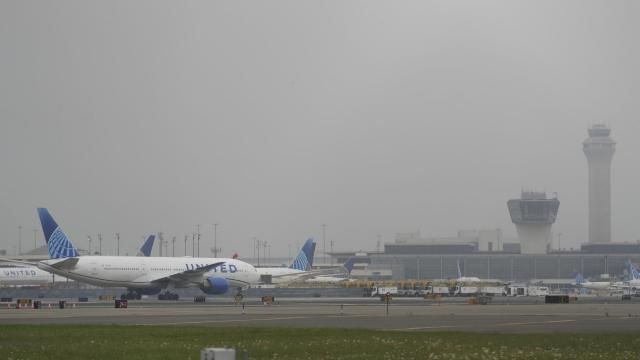 Fog covers planes and control towers at Newark Liberty International Airport in Newark, N.J., Monday, May 5, 2025. (AP Photo/Seth Wenig)