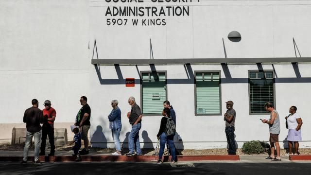 FILE — People wait outside a Social Security Administration office before it opened for the day in Glendale, Ariz., April 8, 2025. Jeremy M. Feigenbaum, New Jersey’s solicitor general, pointed out that children of immigrants born in states without birthright citizenship might not be able to get Social Security numbers. (Adriana Zehbrauskas/The New York Times)