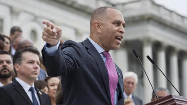 House Minority Leader Hakeem Jeffries, D-N.Y., and the Democratic Caucus, assemble on the steps of the Capitol to condemn President Donald Trump's signature bill of tax breaks and spending cuts, in Washington, Wednesday, July 2, 2025. (AP Photo/J. Scott Applewhite)
