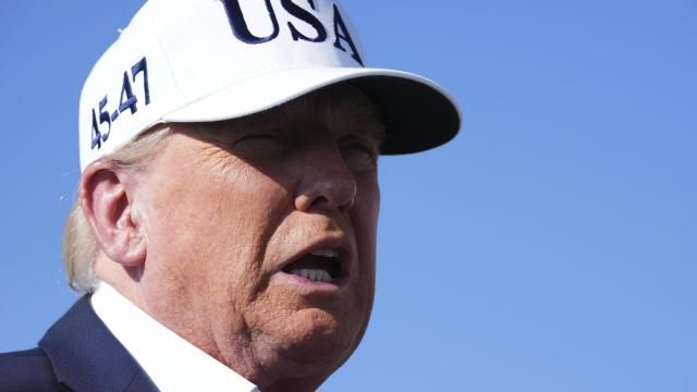 President Donald Trump speaks with reporters before boarding Air Force One at Morristown Municipal Airport in Morristown, N.J., Sunday, July 6, 2025, en route to Washington. (AP Photo/Jacquelyn Martin)