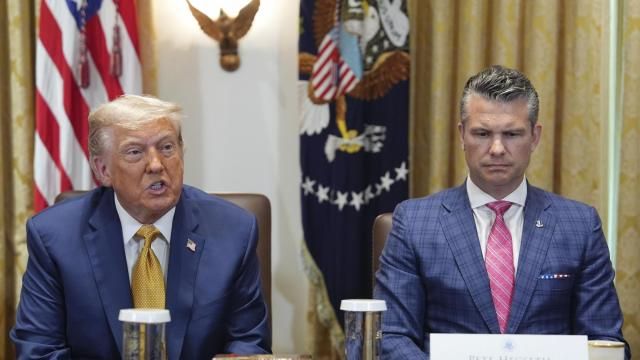 President Donald Trump, left, with Defense Secretary Pete Hegseth, right, during a cabinet meeting at the White House, Tuesday, July 8, 2025, in Washington. (AP Photo/Evan Vucci)