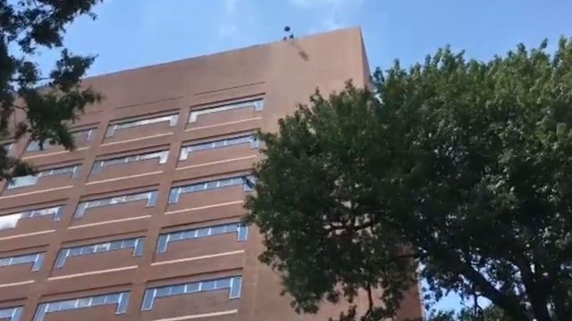 WATCH: 100 pounds of silly putty fly off 141-foot building