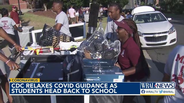 As students head back to school, CDC relaxes COVID-19 guidelines